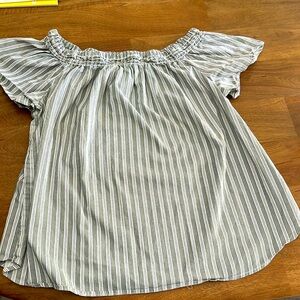 Black and white striped top.